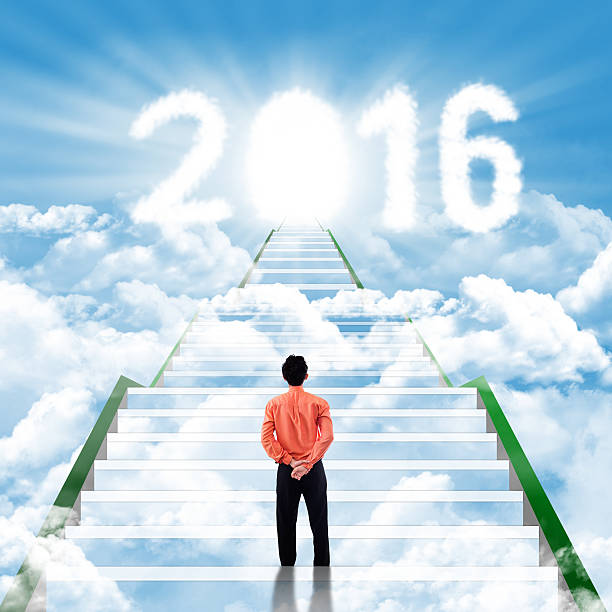 istock Businessman on the stairs with numbers 2016 497809600