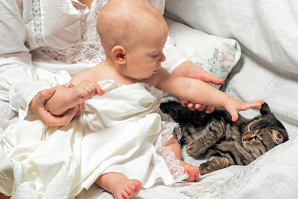 istock Baby with her ​​mother's support recognizes the world . 497810162
