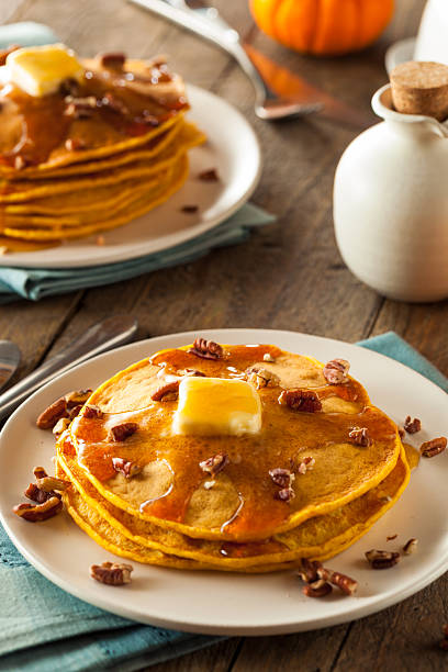 istock Homemade Pumpkin Pancakes with Butter 497810230