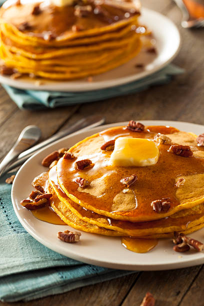 istock Homemade Pumpkin Pancakes with Butter 497810286