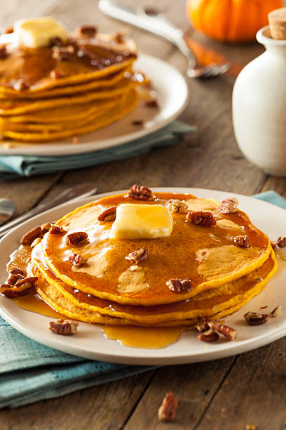 istock Homemade Pumpkin Pancakes with Butter 497810310