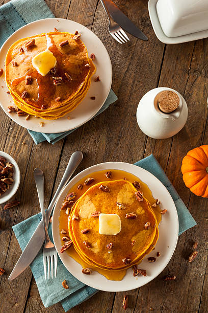 istock Homemade Pumpkin Pancakes with Butter 497810440