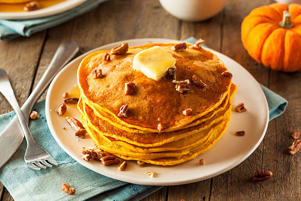 istock Homemade Pumpkin Pancakes with Butter 497810606