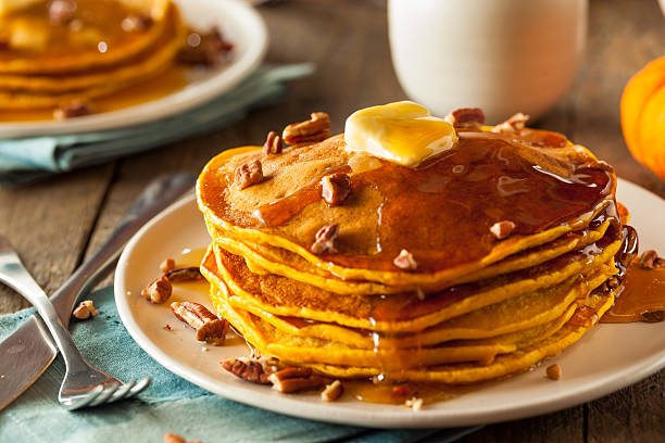 istock Homemade Pumpkin Pancakes with Butter 497810626