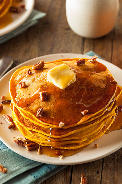 istock Homemade Pumpkin Pancakes with Butter 497810644