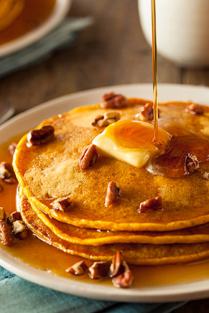 istock Homemade Pumpkin Pancakes with Butter 497810682