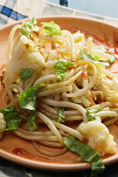 Pasta with cauliflower on plate closeup stock photo