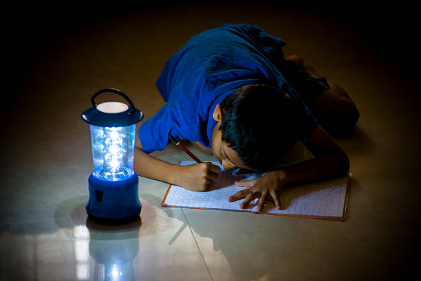 istock school kids doing homework with our LED light 497811854