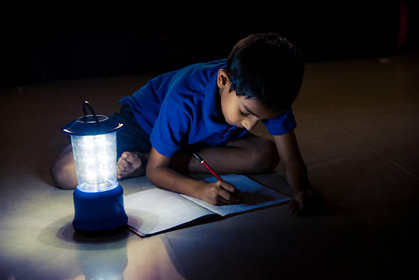 istock school kids doing homework with our LED light 497812446