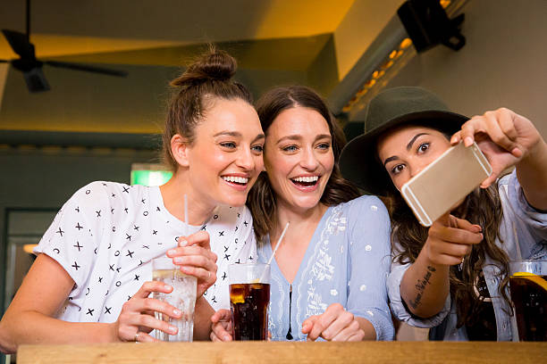 istock Girl pointing at her phone 497815560