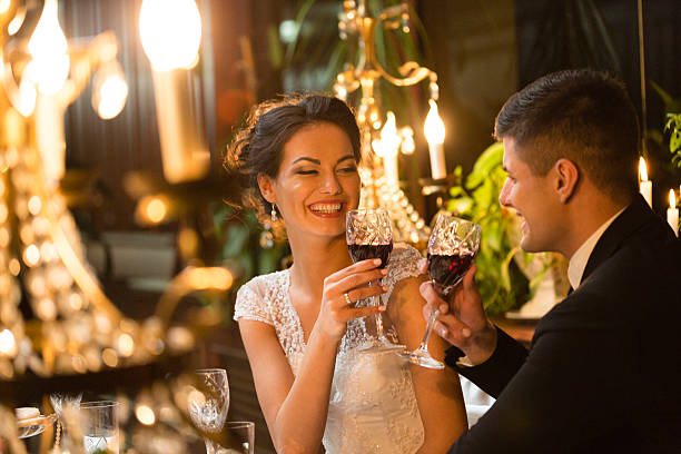 istock Bride and groom toasting at wedding 497816788