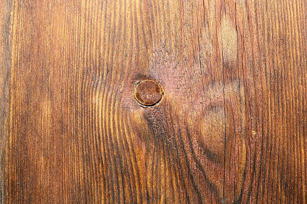 detail on spruce plank with knot, close up