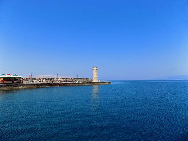 istock Sea, beacon and blue sky 497825692