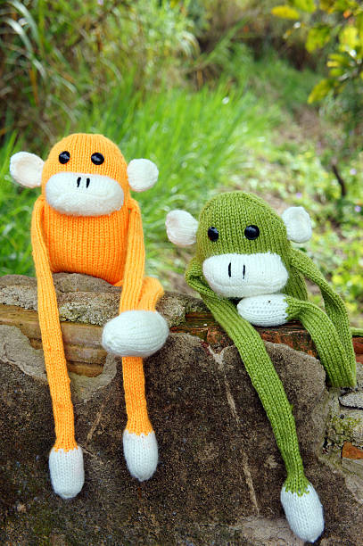 istock knitted lonely monkey, symbol of year 2016 497830148