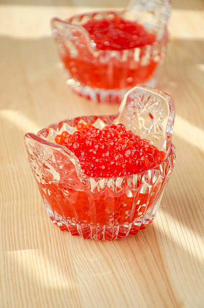 istock Red caviar in a crystal bowls 497831332