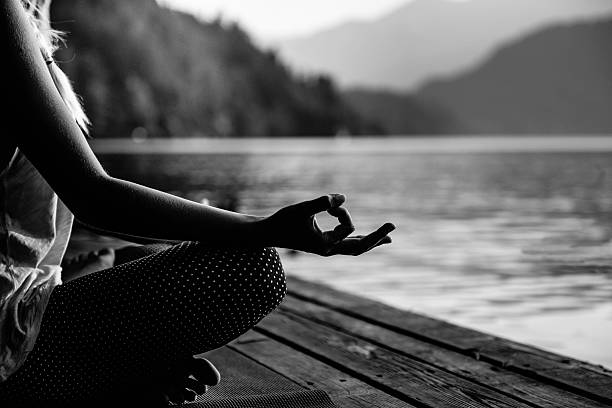 istock Meditation by the lake 497832354