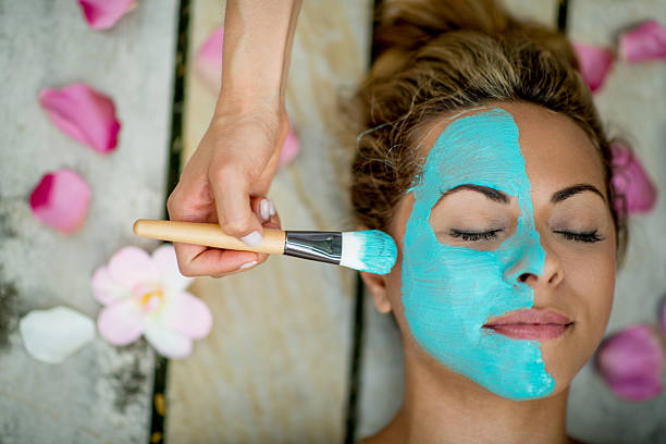 istock Woman at the spa with a facemask 497832614