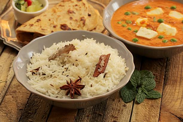 istock Rice naan and Paneer Butter masala Indian curry 497833338