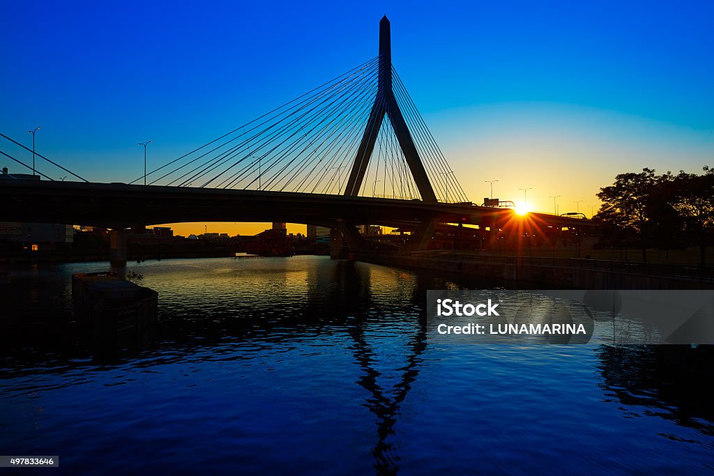 Boston Zakim bridge sunset in Massachusetts Boston Zakim bridge sunset in Bunker Hill Massachusetts USA Leonard P. Zakim Bunker Hill Bridge Stock Photo