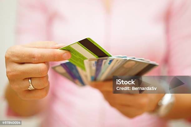 Woman Choose One Credit Card Concept Of Credit Debt Stock Photo - Download Image Now