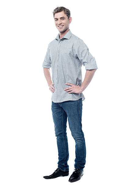 istock Smiling casual young man isolated on white 497852697