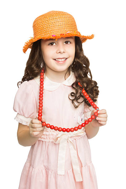 istock Girl in red beads 497856886