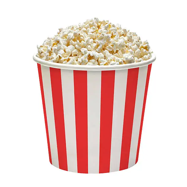 Popcorn in striped bucket isolated on white background