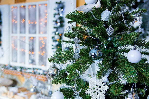 istock Christmas fir-tree in white flowers 497860104