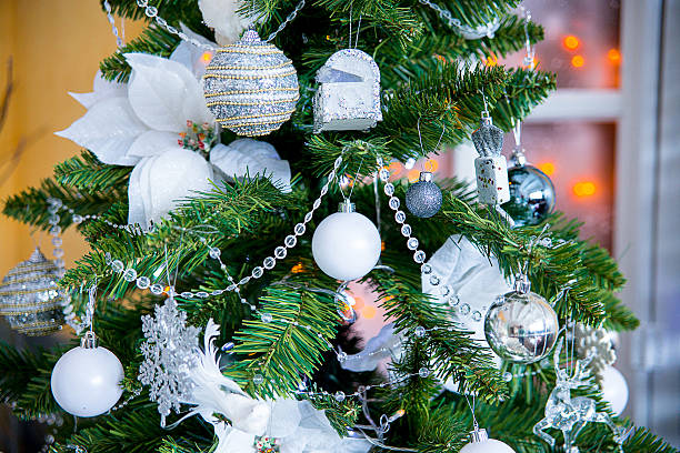 istock Christmas fir-tree in white flowers 497861902
