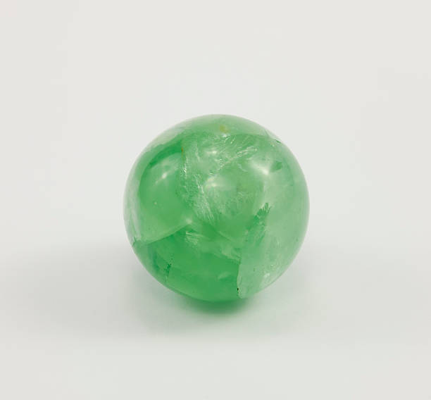 istock Small ball of fluorite, gemstone green. 497862816