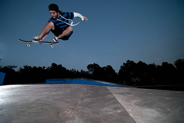 istock Skateboarder on a ollie 497863122