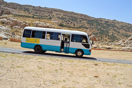 Selah, Jordan - May 27, 2015: Public Bus Transportation system traveling out of the main city towards smaller remote cities in the countryside. 