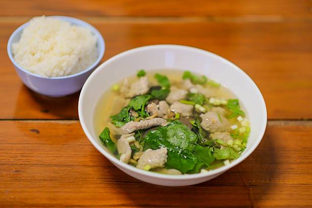istock Ekaehla,Rice on wooden floor. 497865436