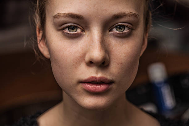 istock beautiful girl with freckles 497865976
