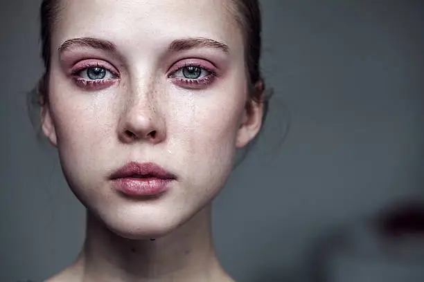 Photo of beautiful young girl crying