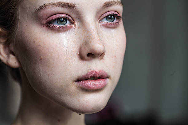 istock beautiful young girl crying 497866604