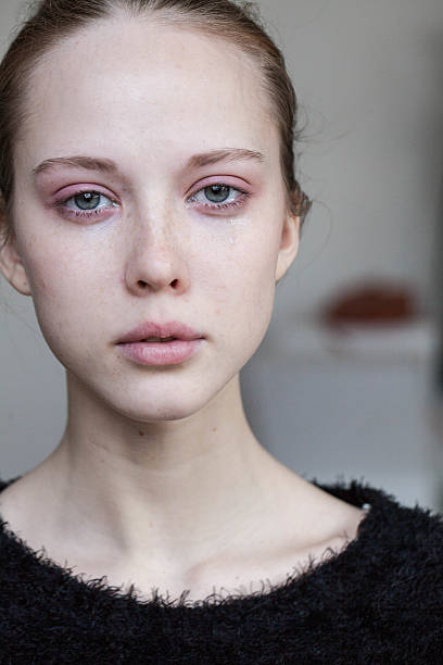istock beautiful young girl crying 497866760