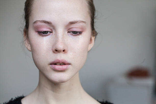 istock beautiful young girl crying 497866790