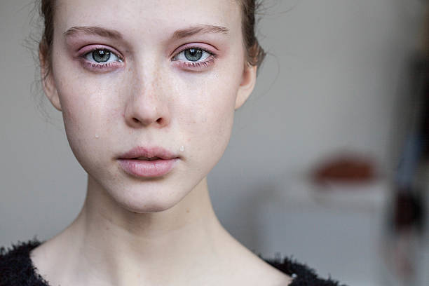 istock beautiful young girl crying 497866818