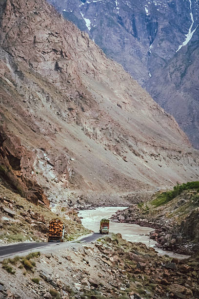 istock Pakistani trucks on a mountain road 497866954