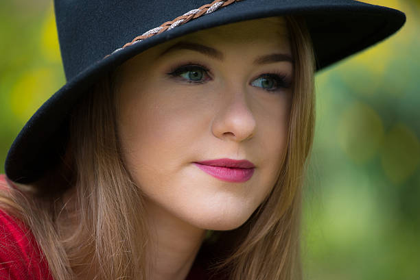 istock Young woman in a brimmed hat. 497867678