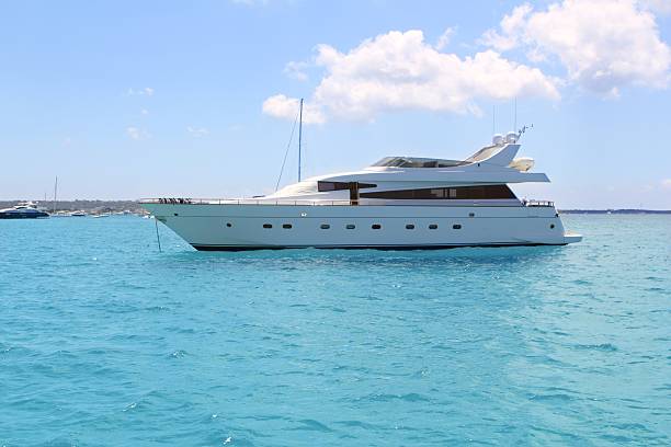 istock luxury yacht in turquoise Illetes Formentera 497867686