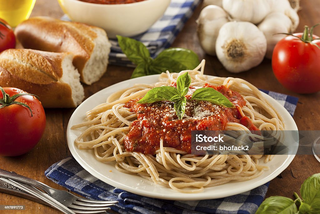 Homemade Spaghetti with Marinara Sauce Homemade Spaghetti with Marinara Sauce and Basil Basil Stock Photo