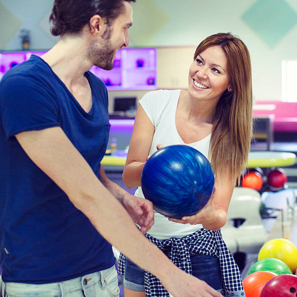 istock Cheerful Friends Bowling Together. 497892615