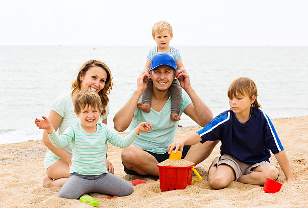 istock Positive parents with kids on vacation 497894107