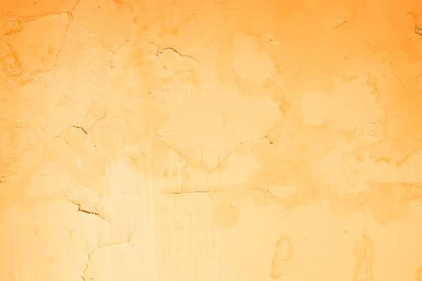 Dilapidated building exterior in Lyon with peeling paint and worn concrete. Ideal as a border or frame for text.