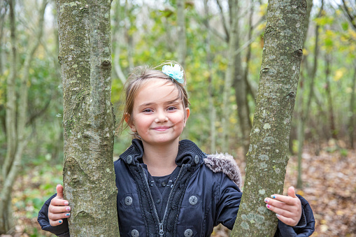 Seven year old girl in woods