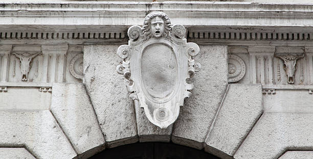 istock carved figure in entrance 497897115