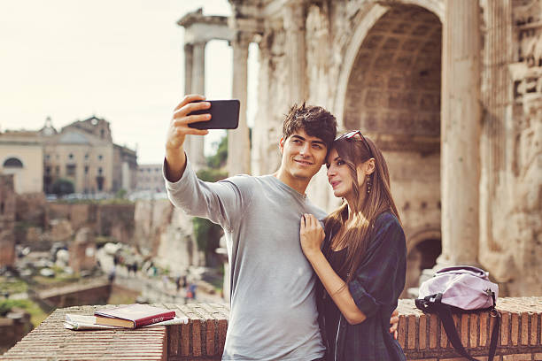 istock Tourist couple taking a selfie in Rome 497900536