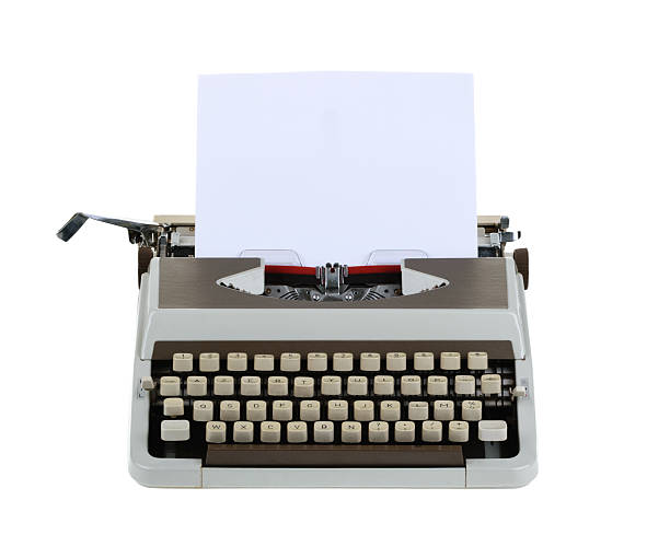 istock Typewriter with sheet of paper isolated on white background.whit 497903550